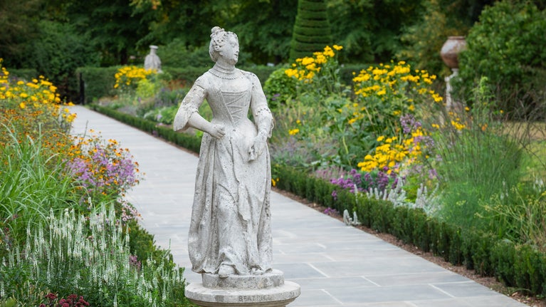 Female figure statue in the Long Garden at Cliveden, Buckinghamshire.